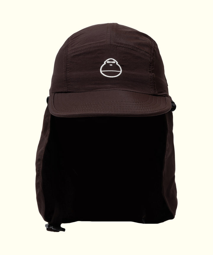 Brown Surf Hat with flap for water and sun protection, featuring an embroidered logo, perfect for outdoor adventures. Sun Bum.