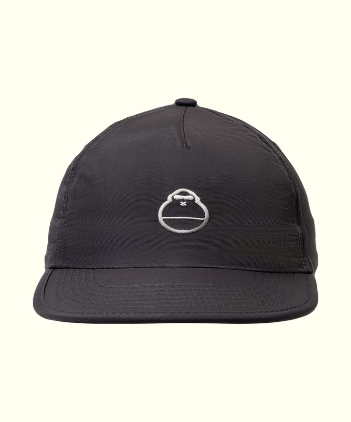 Black travel hat with a simple, stylish logo, perfect for any adventure. Sun Bum.