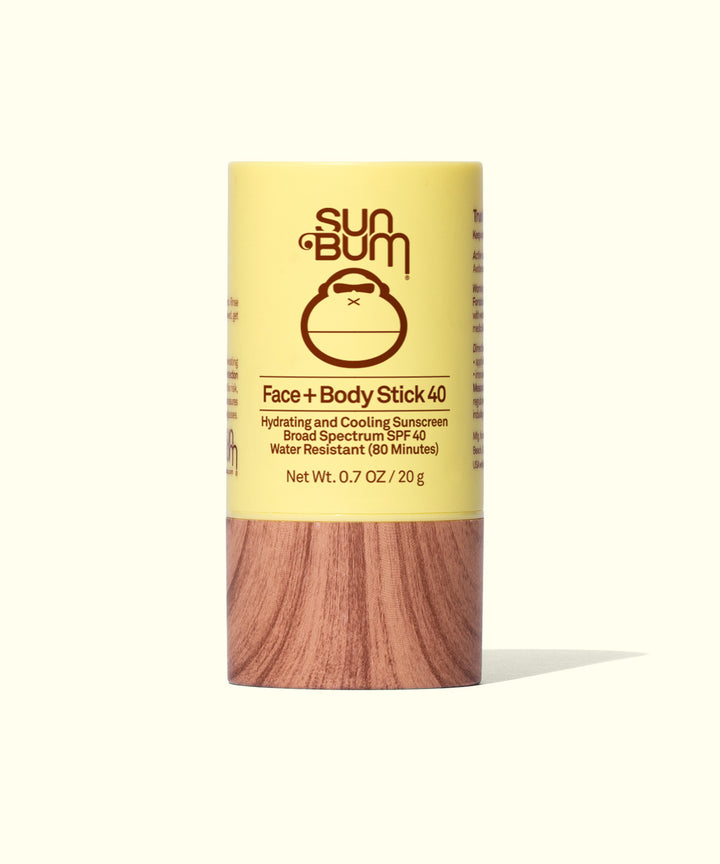 Sun Bum Face and Body Stick SPF 40 sunscreen in a yellow tube with brown base, featuring hydrating and cooling formula for easy on-the-go sun protection. Water-resistant for 80 minutes. Sun Bum