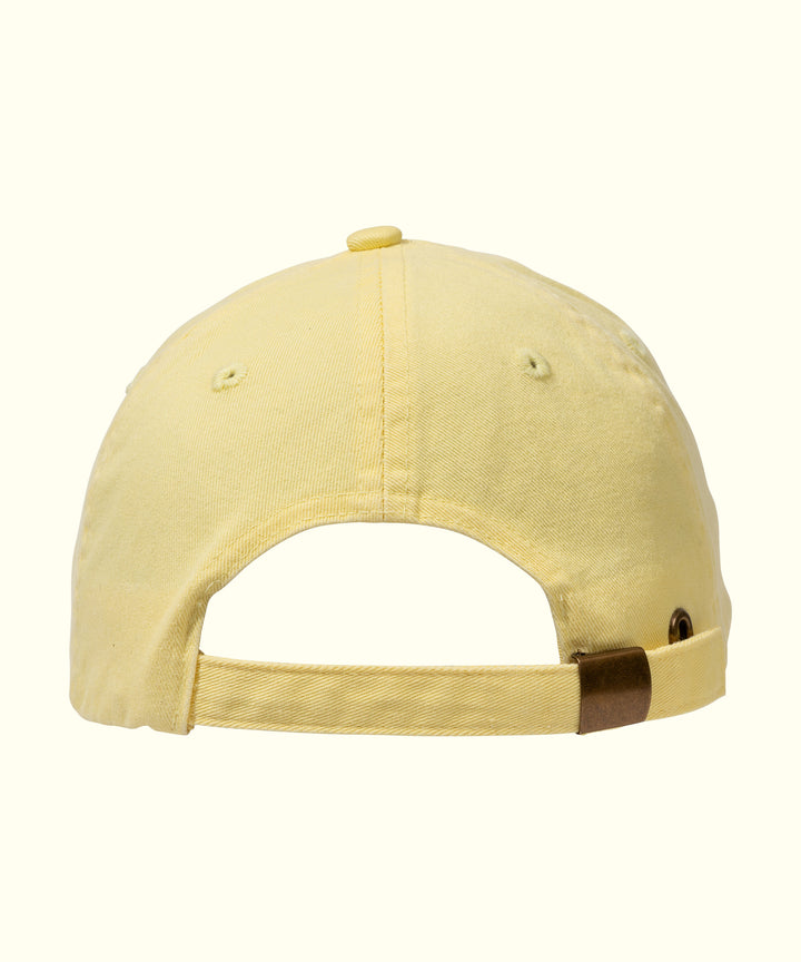 Yellow Dad Hat with adjustable strap viewed from the back, perfect for lazy hair days. Sun Bum