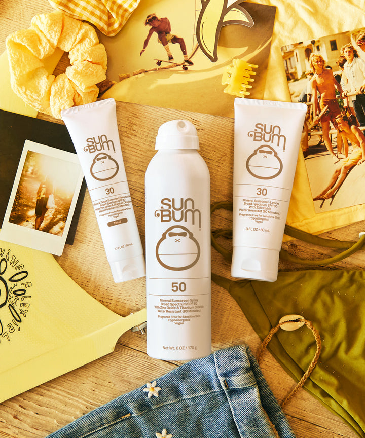 Mineral SPF 30 Sunscreen Lotion with zinc-based, fragrance-free formula providing Broad Spectrum protection, displayed next to other Sun Bum products. Sun Bum.