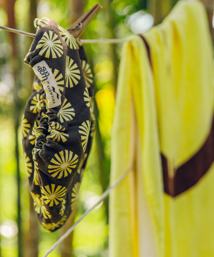 Limited Edition Hair Towel by SB x Slowtide in chic floral print, soft and absorbent, designed to dry your hair faster while reducing frizz, breakage, and dullness - Sun Bum.