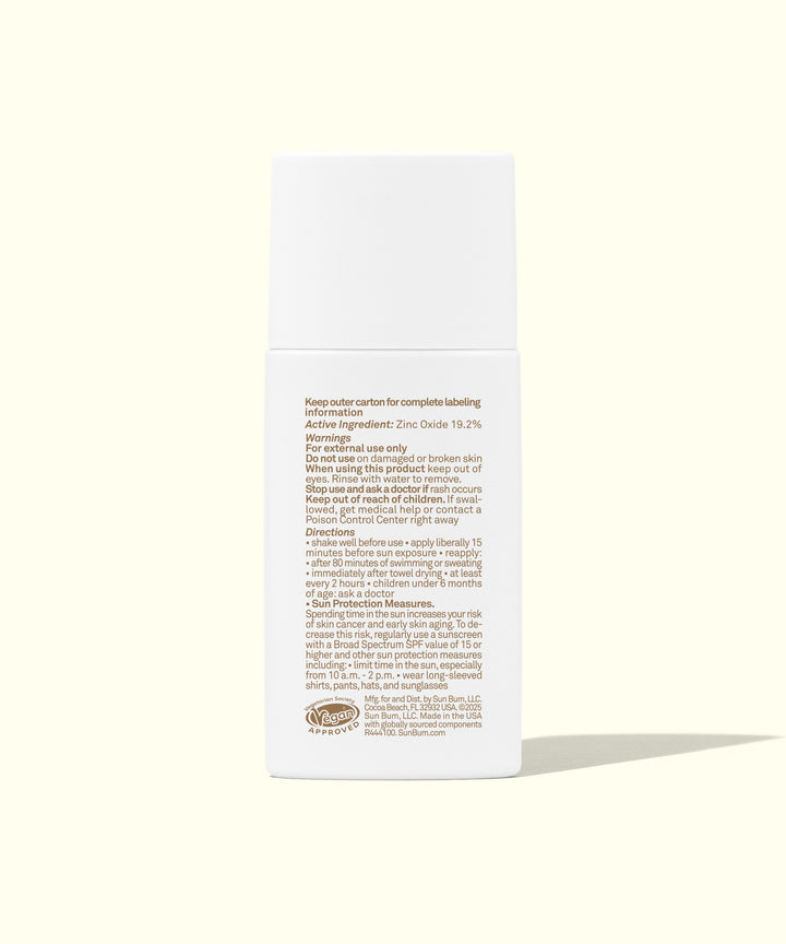 White bottle of Mineral Liquid Face 30 sunscreen with product details and instructions on label, offering sheer, water-resistant protection for face and body. Sun Bum