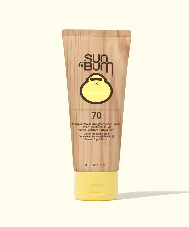 Sun Bum Original SPF 70 Sunscreen Lotion in 3 fl oz bottle with a wood grain design. Sun Bum